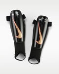 Nike Charge Youth Soccer Shin Guards Black/Bright Crimson/Blur product image 1, provided for visual reference and product